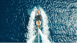 Different types of boats, illustrating boat specifications as an insurance factor.